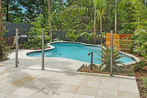 Pool with landscape and fence